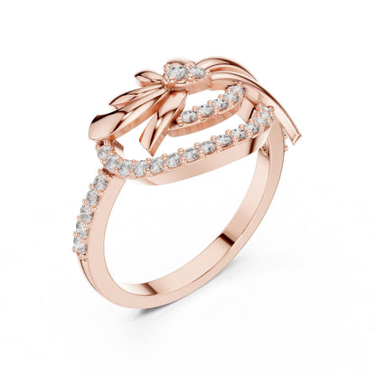 Rose gold floral swirl moissanite diamond ring with vintage leaf design, perfect as an engagement or promise band for women.