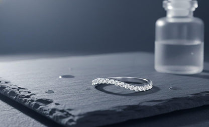 Riora moissanite curved wedding band in gold, nickel-free hypoallergenic ring with minimal diamond accents, perfect for stacking jewelry.