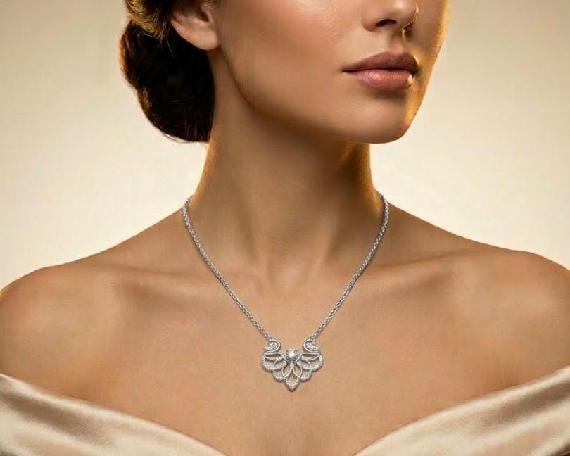 Elegant swan-shaped moissanite necklace by Riora featuring a rose gold and silver pendant, romantic bridal jewelry.