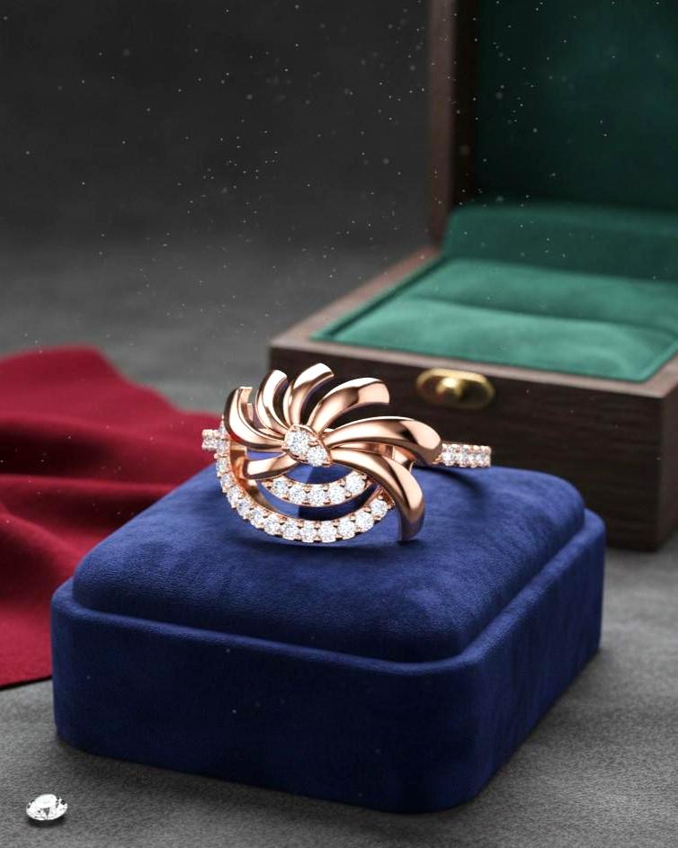 Rose gold floral swirl moissanite diamond ring with vintage leaf design, perfect as an engagement or promise band for women.