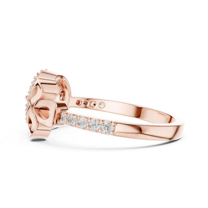 Vintage eye bow ring by Riora featuring moissanite and diamond accents on a delicate evil band for women.