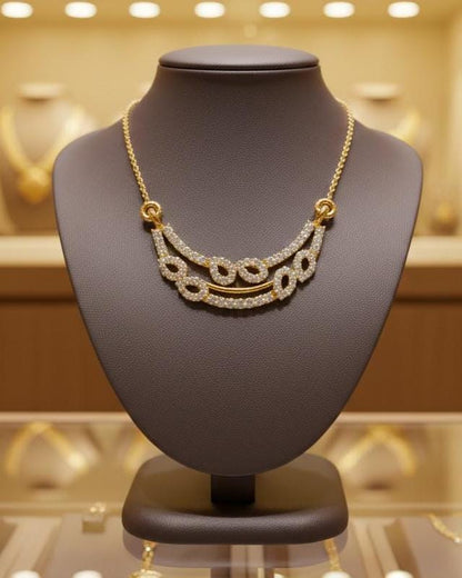 Gold layered necklace with dainty moissanite diamonds and minimalist double chain, perfect for everyday wear and gifting.