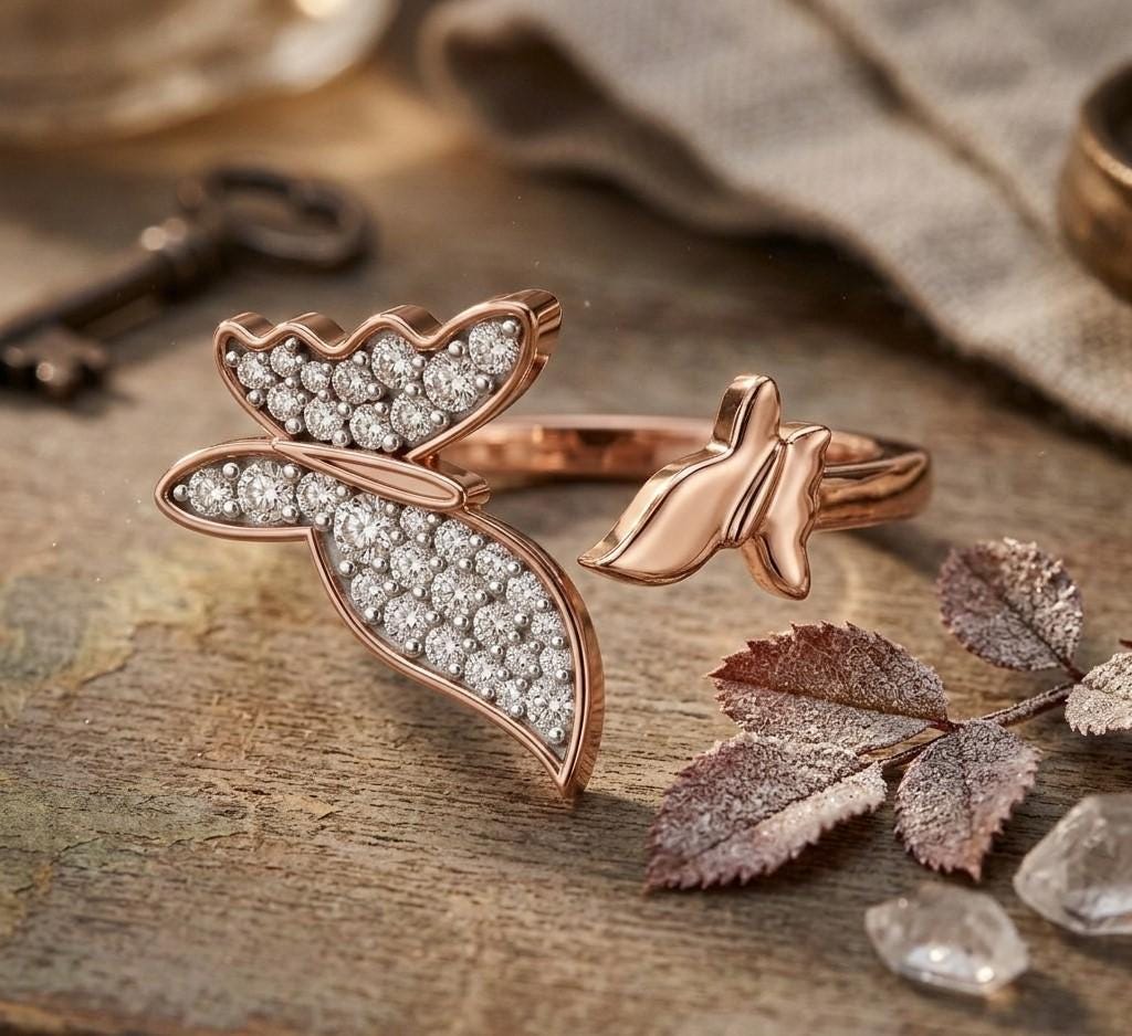 Riora moissanite butterfly ring in gold, rose gold, and silver with a nature-inspired, minimalist design and diamond-like sparkle