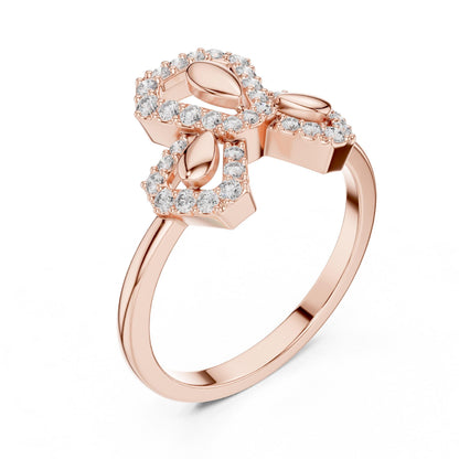 Rose gold moissanite diamond ring with a delicate bow knot design, featuring minimalist and dainty bridal jewelry style.