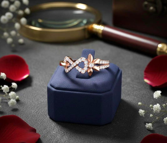 Gold infinity flower ring with moissanite diamonds, featuring a floral minimalist design for engagement or special gift.