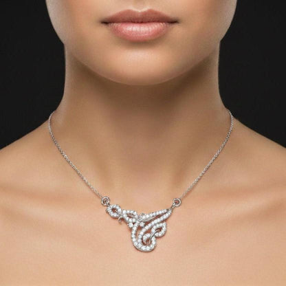 Riora moissanite swirl pendant necklace with gold, rose, and silver tones, elegant bridal or anniversary jewelry.