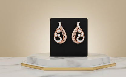 Riora moissanite teardrop stud earrings in gold, rose gold, and silver with a non-allergic, nickel-free design, perfect for bridal gifts