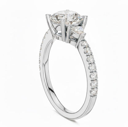 Elegant rose gold and silver CZ engagement ring by Riora featuring a sparkling solitaire stone and intricate band design.