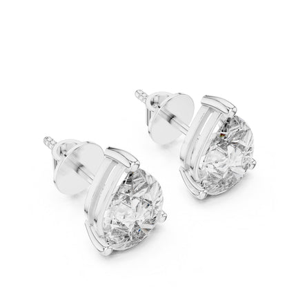 Pear cut moissanite diamond stud earrings in rose gold, minimalist teardrop design, perfect for bridal or wedding jewelry.