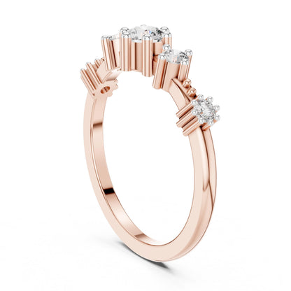Riora Moissanite five stone vintage crown prong engagement and anniversary band with rose gold finish on a woman's hand