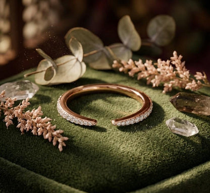 Riora open cuff moissanite ring with diamond-style design in rose gold, featuring a minimalist half eternity band and adjustable fit