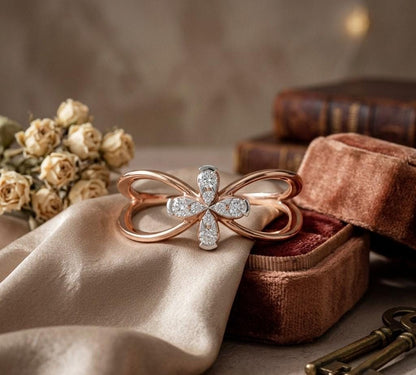Riora moissanite flower ring with diamond-style floral design in rose gold, minimalist wedding and promise band jewelry