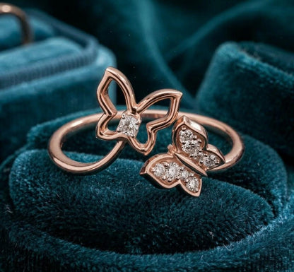 Rose gold Moissanite butterfly ring with an adjustable, nature-inspired band and minimalist design, perfect for elegant promise jewelry.