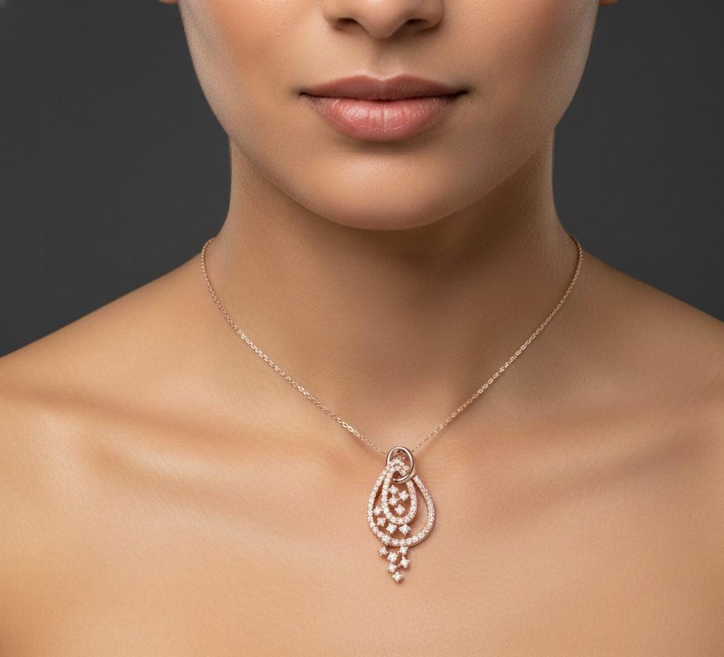 Elegant moissanite teardrop pendant necklace in gold, rose gold, or silver with hypoallergenic design, ideal for bridal or Valentine jewelry.