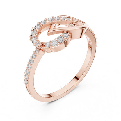 Rose gold Infinity Heart Moissanite diamond ring with a delicate band, symbolizing love and commitment, by Riora.