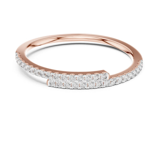 Rose gold moissanite curved wedding band with half eternity diamond style design, minimalist stacking ring by Riora.