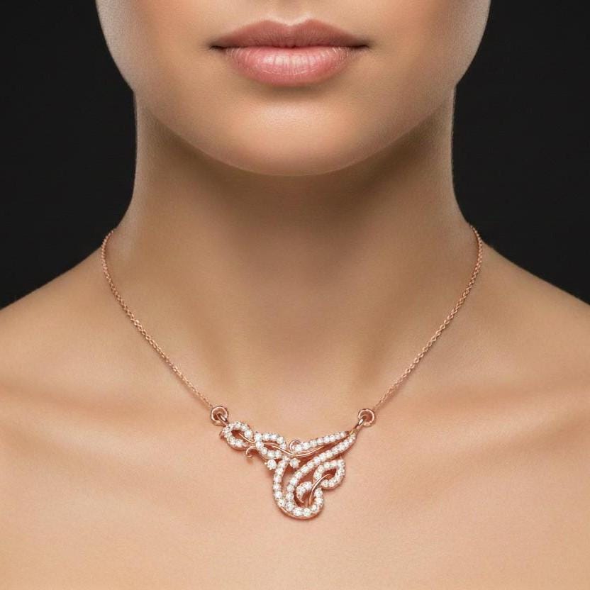 Riora moissanite swirl pendant necklace in gold, rose, and silver, elegant bridal or anniversary jewelry with sparkling gemstone accents.