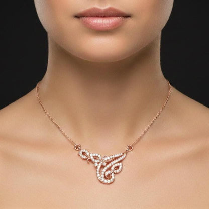 Riora moissanite swirl pendant necklace in gold, rose, and silver, elegant bridal or anniversary jewelry with sparkling gemstone accents.