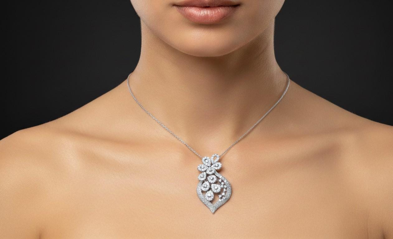 Riora floral leaf pendant necklace with a 22-inch adjustable chain in gold, rose, or silver, hypoallergenic and elegant for women