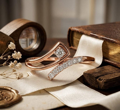 Riora Moissanite Wave Ring with curved open design in silver, gold, and rose gold, featuring minimalist diamond-style accents.