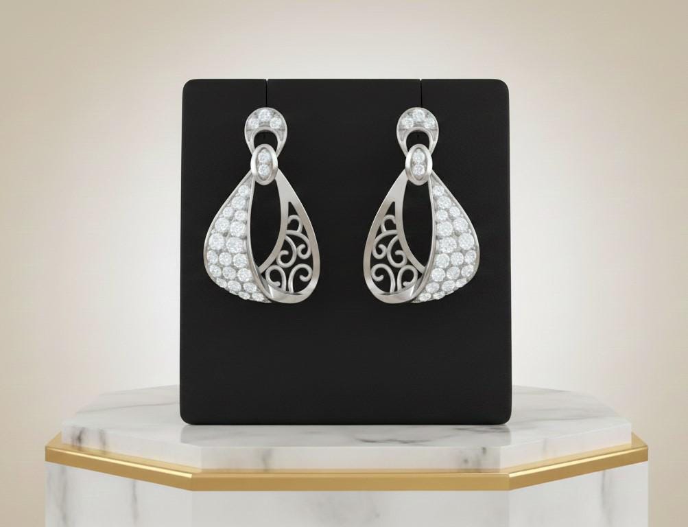 Riora moissanite drop stud earrings in gold, silver, and rose gold with elegant bridal dangle design for women.