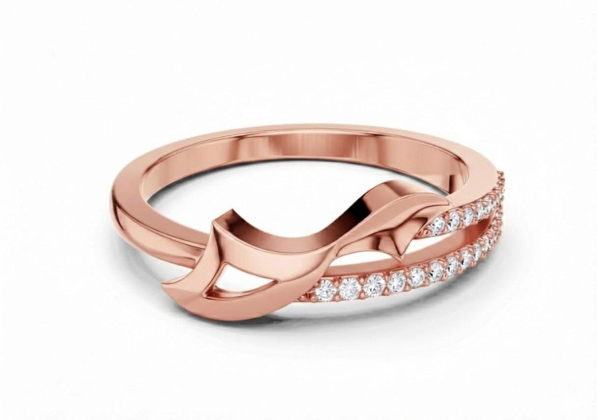 Riora infinity twist moissanite diamond ring in gold rose, minimalist stackable wedding band with dainty twist design.