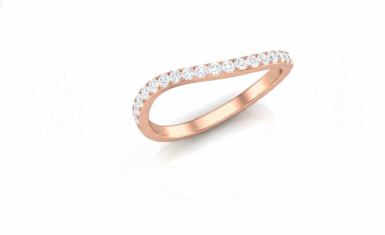 Riora gold moissanite curved wedding band with minimal diamond accents, nickel-free hypoallergenic stacking jewelry piece.