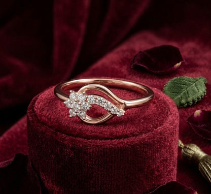 Riora moissanite flower infinity ring with floral design, romantic wedding jewelry in delicate rose gold featuring a bridal-inspired style.