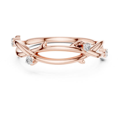 Rose gold moissanite branch ring with nature-inspired twig design and minimalist diamond look by Riora.