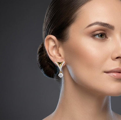 Riora Moissanite drop earrings in V-shape with rose gold and silver finish, featuring dangle bridal jewelry style.
