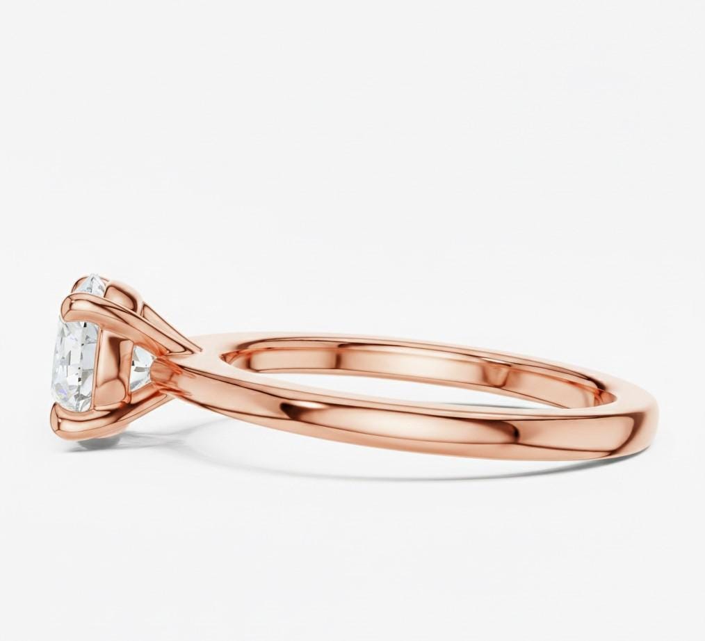 Riora minimalist gold moissanite diamond solitaire ring with thin band, elegant promise and stackable wedding jewelry.