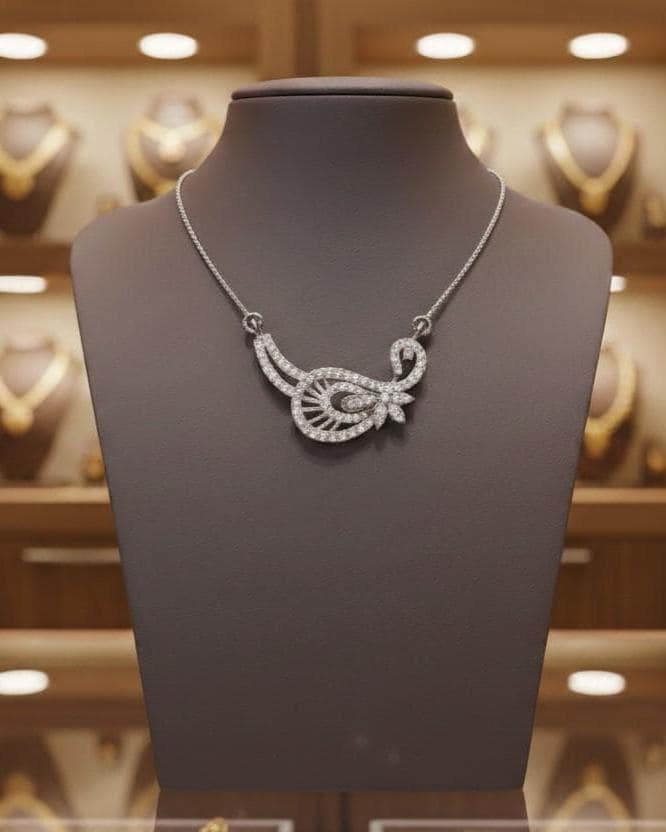 Riora elegant gold moissanite leaf necklace with delicate design, perfect minimalist bridal jewelry or wedding gift for her.