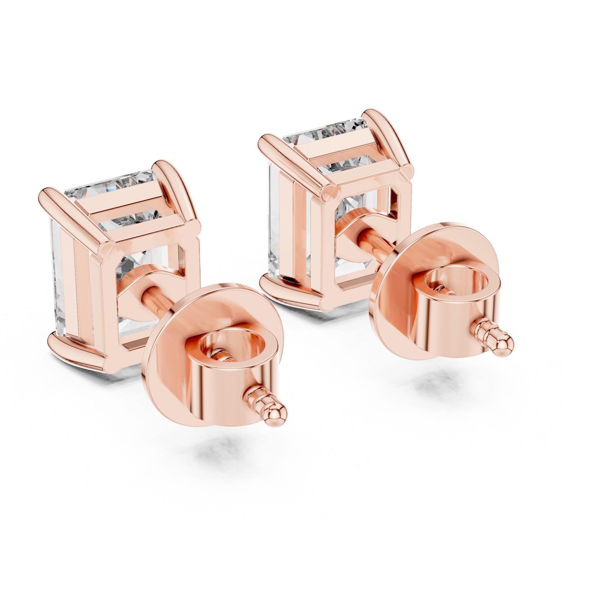 Riora emerald cut moissanite diamond stud earrings, 7.5x5.5mm, minimalist bridal jewelry for wedding or everyday luxury.