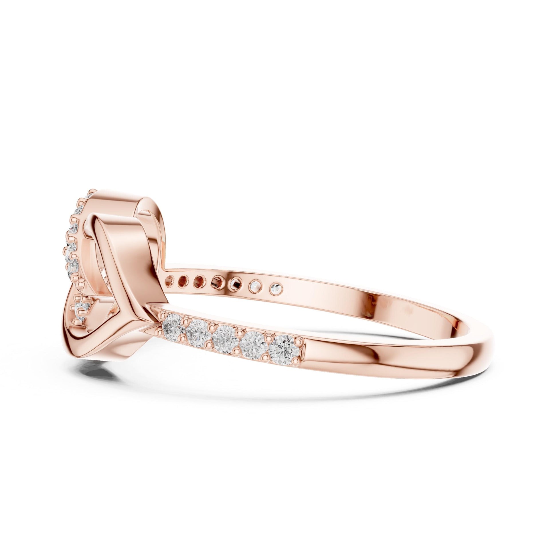 Rose gold infinity heart moissanite engagement ring with dainty love design, romantic jewelry by Riora featuring a sparkling diamond band.