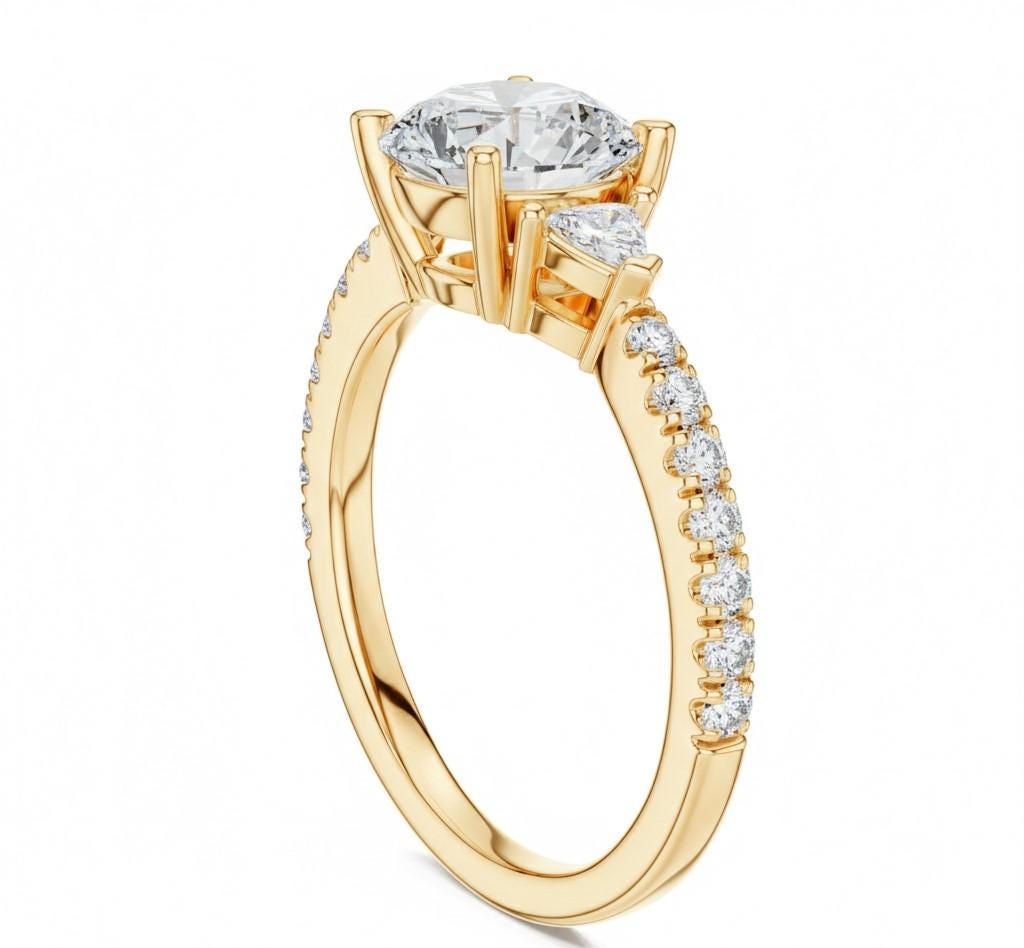 Elegant rose gold and silver CZ engagement ring by Riora featuring a sparkling center stone and delicate band for bridal jewelry