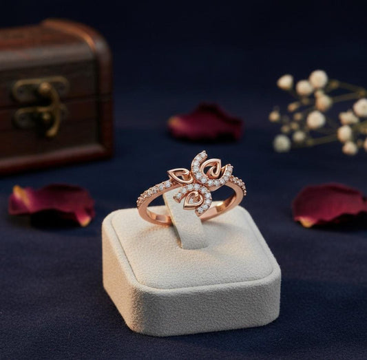 Rose gold butterfly moissanite diamond ring by Riora featuring delicate nature-inspired design and minimalist elegance.