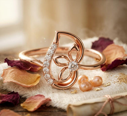 Riora moissanite floral butterfly engagement ring in rose gold with delicate nature-inspired design for women.