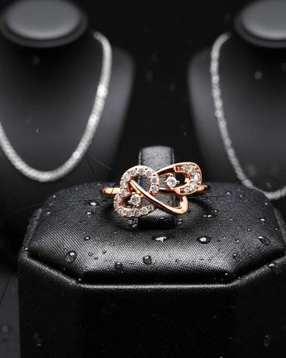 Rose gold infinity heart moissanite diamond promise ring with minimalist romantic design, perfect for love and anniversary jewelry.