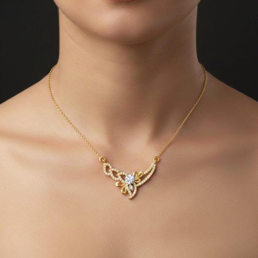 Riora elegant moissanite butterfly pendant necklace in gold rose, dainty bridal jewelry gift for women showing the detailed butterfly design