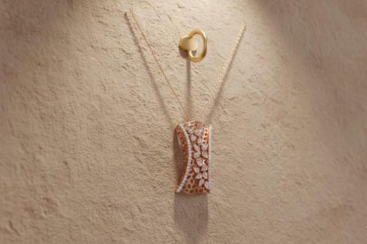 Riora moissanite leaf pendant necklace in gold, rose, and silver, showcasing a delicate leaf design on a hypoallergenic chain.