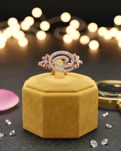 Riora floral swirl moissanite diamond ring in rose gold, vintage-inspired bridal engagement band with intricate floral design.