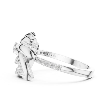 Rose gold floral swirl moissanite diamond engagement ring with vintage leaf design, crafted by Riora for women.
