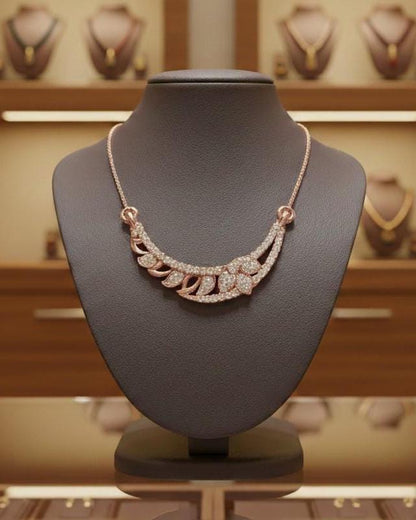 Rose gold moissanite leaf necklace by Riora featuring a minimalist wedding pendant for women, ideal for bridal jewelry.
